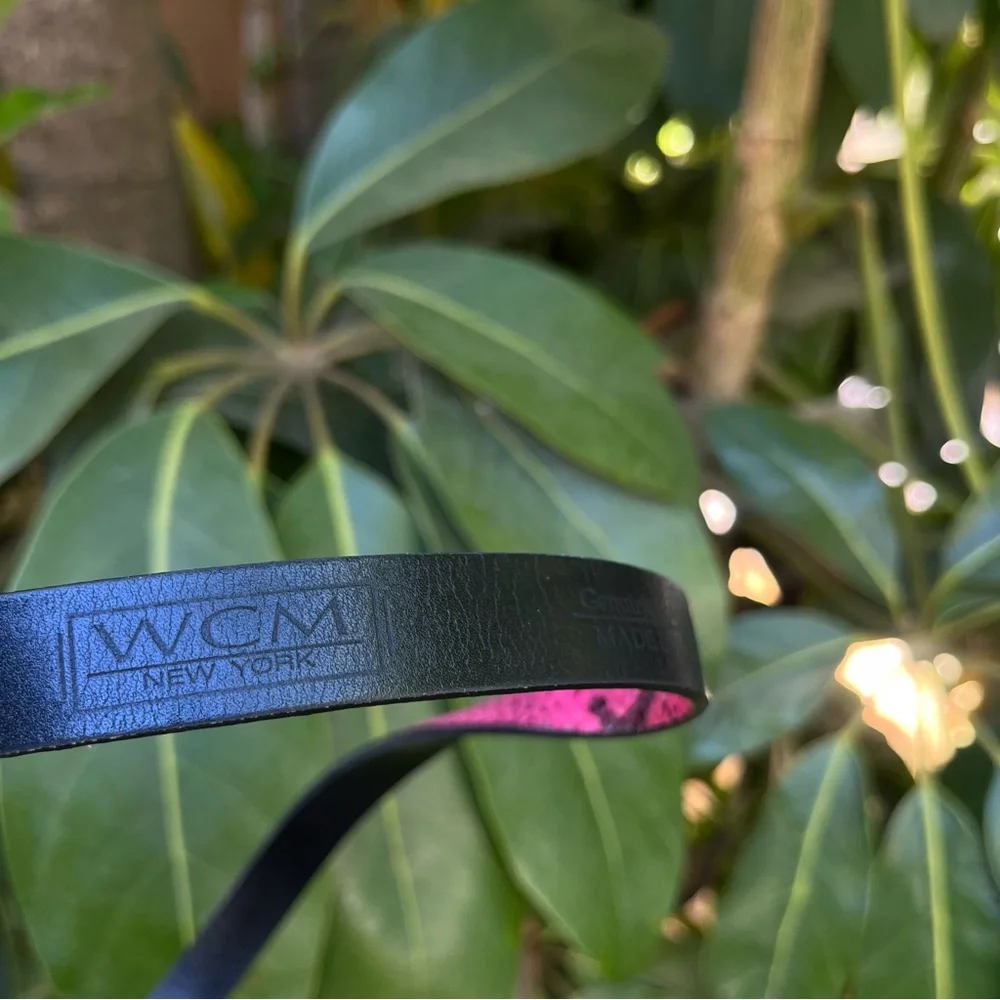Vintage WCM New York snakeskin / python belt in pink and black.